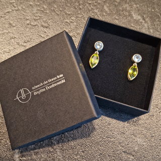 Peridot und Aquamarin Ohrstecker aus 750 Gelbgold und 925 Silber